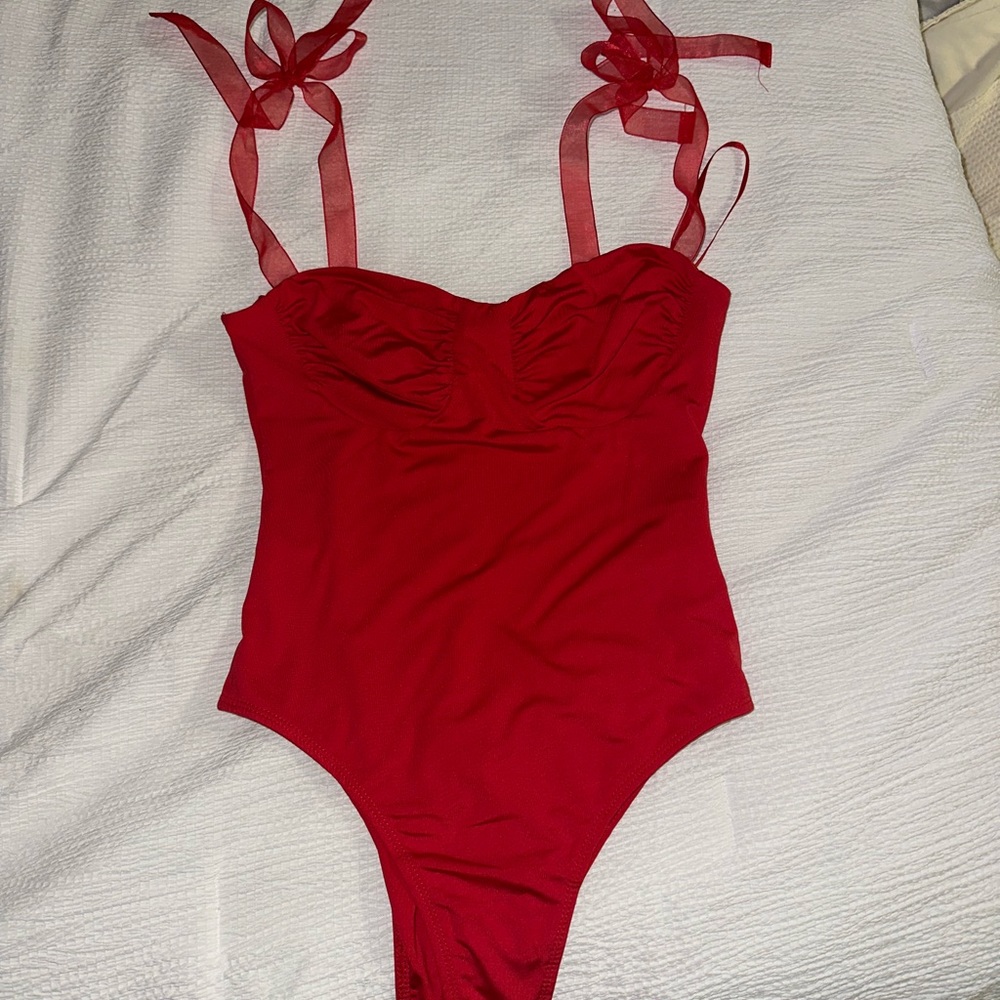 red body suit